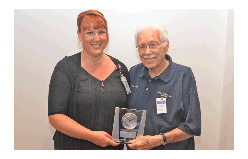 Aurora Advocate outpatient clinics' Volunteer Ed Young receives 25 year service award