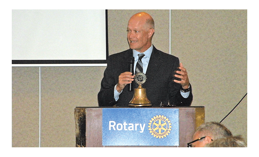 Joe McMahon, Kane County State’s attorney, shares his concerns about the opium epidemic with Rotary Club of Aurora members, Monday at Two Brothers Roundhouse.