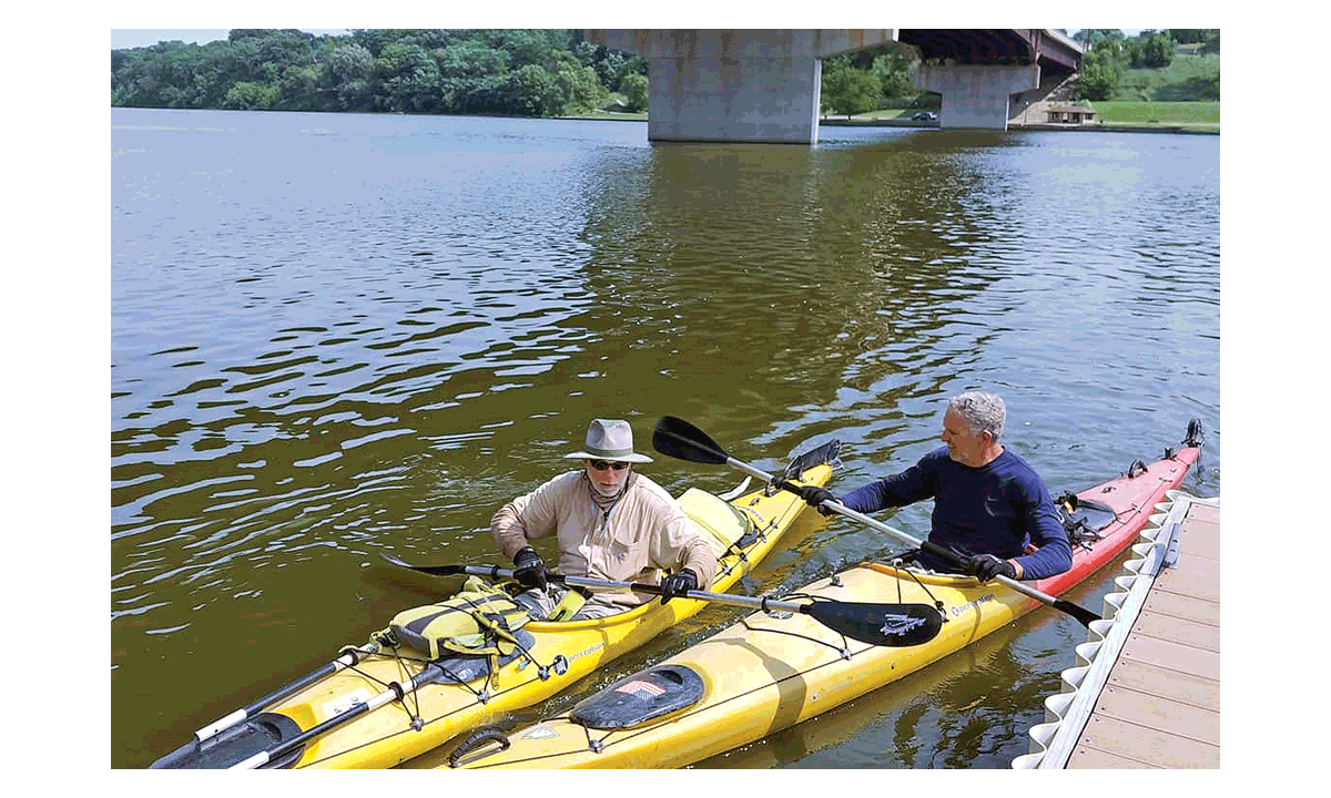 Chuck Roberts and Charlie Zine reach the dock Monday, July 23 in Ottawa at the end of their eight-day, 202-mile trip in Ottawa at the confluence of the Fox River and Illinois River.