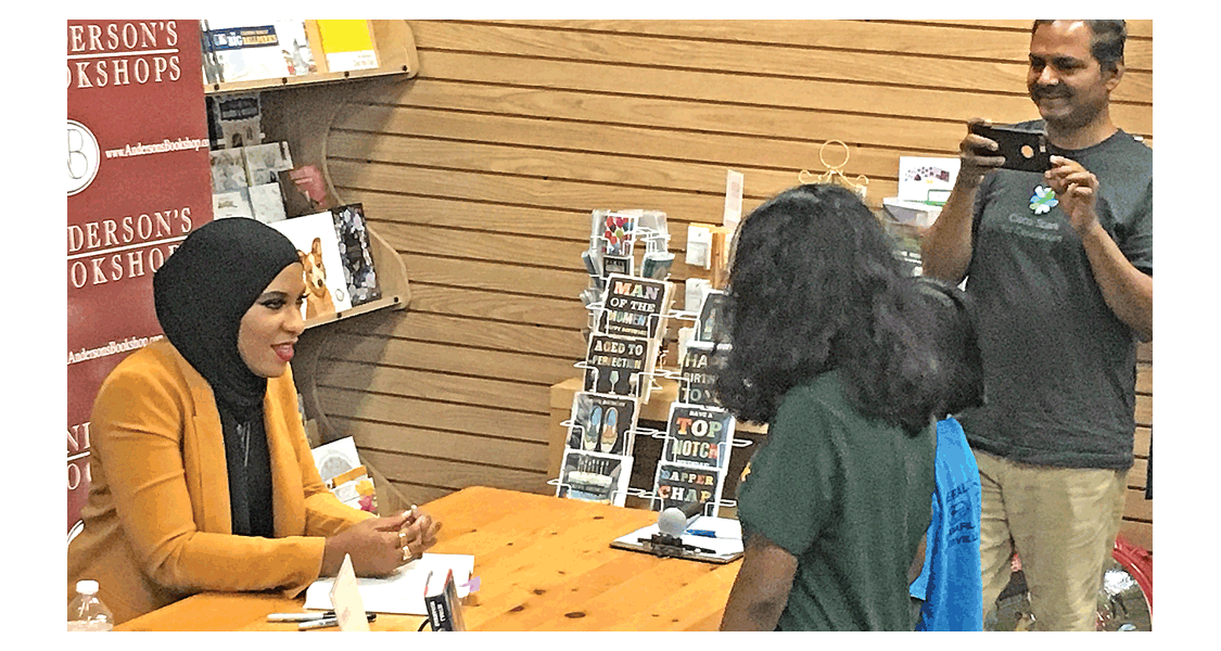Ibtihaj Muhammad, left, at Anderson's Bookshop in Naperville