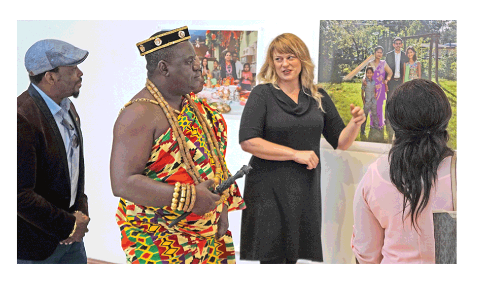 Aklasou Mawuko Kwami Adelan, a cultural and spiritual leader of Togo, a west African country, Monday meets Aurora mayor Richard Irvin, right, and receives a private tour from Jen Evans, director of the Aurora Public Arts Commission. The delegation promoted tourism and trade.