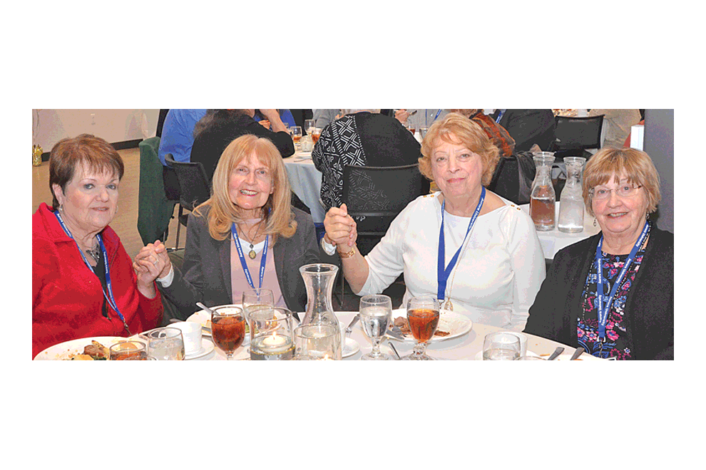 Four Aurora University alumnae at an annual awards dinner in the University Banquet Hall Friday during homecoming are from left: Phyllis Bohy Silmser, Aurora; Phyllis Ninneman Goodrich, Huntington Beach, Calif.; Sherry Hanson Lang, Aurora; and Jean Ninneman Ayer, Brookfield, Wis.. Al Benson/The Voice