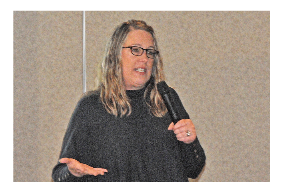 Katie Arko, vice-president of development for the Paramount Theatre in Aurora presents information at the Rotary Club of Aurora
