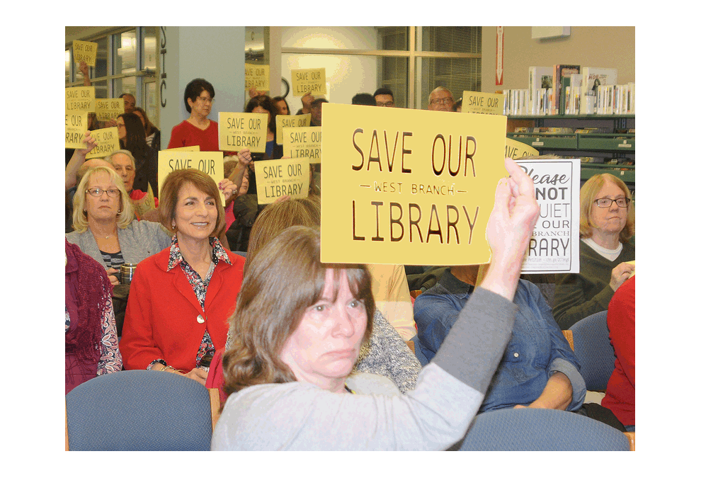 Save our West Branch Library tells the story of the estimated 150 Aurora residents at the special public meeting Tursday, Nov. 8 at the West Branch. Lyle Rolfe/The Voice