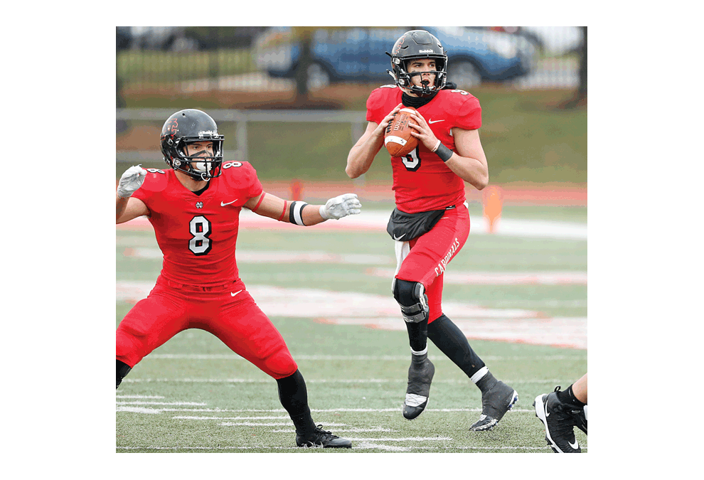 Quarterback Broc Rutter of North Central College looks down the field for a receiver Saturday against visiting Bethel (Minn.) University in a second round Division III playoff game in Naperville. Bethel won, 27-24, to end North Central’s season. North Central College photo