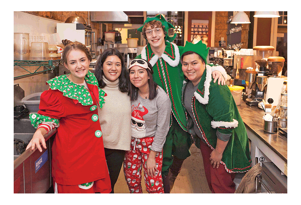 Staff members at Tredwell Coffee in Aurora are ready for the holiday season at the recent Winter Lights event in downtown Aurora. Several upcoming events planned for Aurora area downtowns will help keep the season cozy. Jason Arthur photo