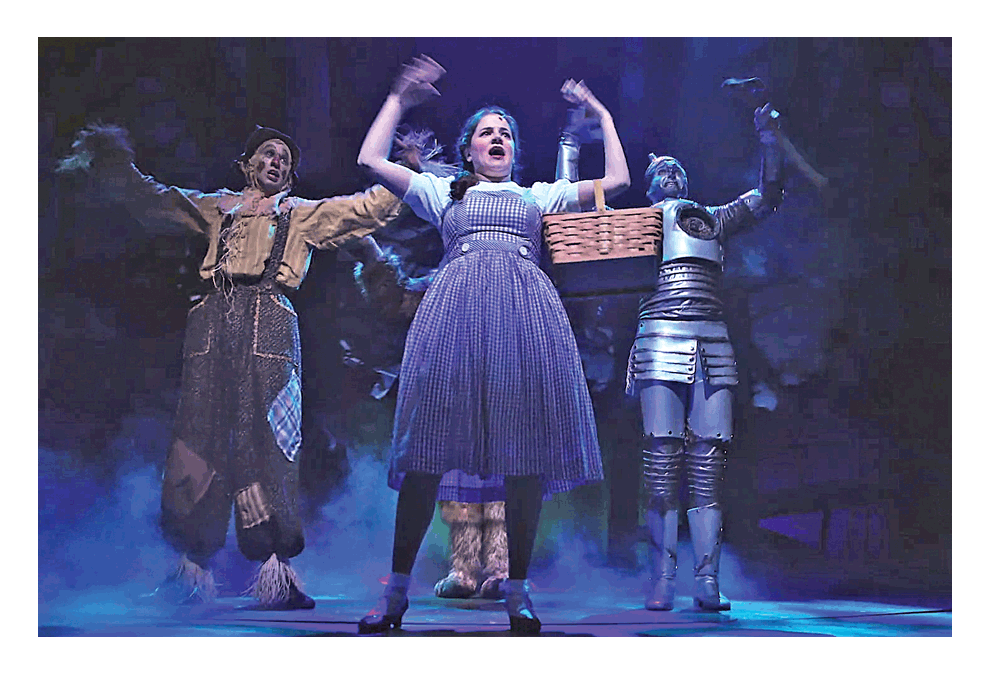 The Scarecrow, Dorothy, and The Tin Man perform at the Wizard of Oz during the run which will end January 6, 2019. The Aurora Public Library will be host to Page to Stage presented by the Paramount School of the Arts Saturday, Dec. 8 at the Santori Public Library of Aurora. Courtesy of Paramount Theatre