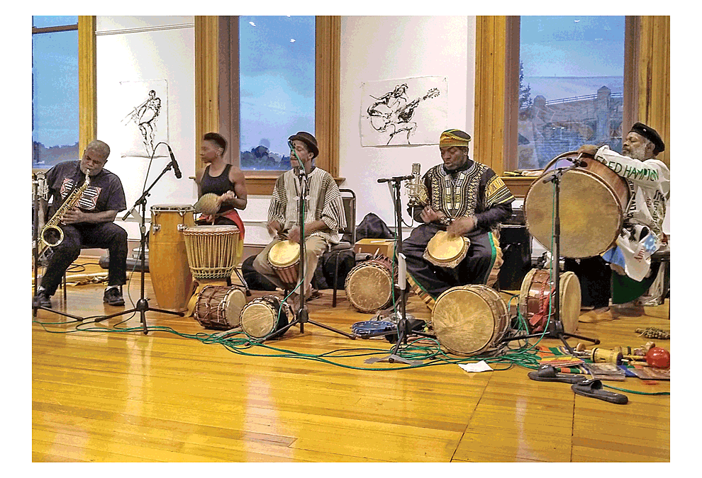 Downtown Aurora fun: There is frequently something fun happening when visitors come in to a downtown museum or place of business. Nyahbingi Drum Choir performs "Songs of Splendour" to close the Jazz Occurrence show in September 2018 on the third floor gallery at Aurora Public Art in downtown Aurora. Photo by Marissa Amoni/Courtesy of Aurora Downtown