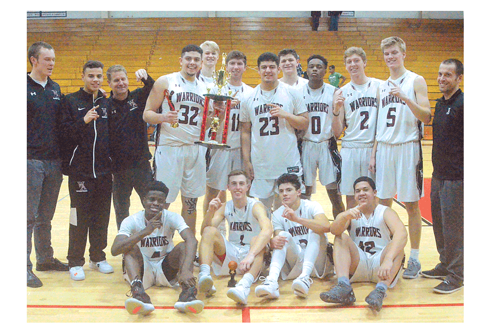 Wheaton Academy team members pose for a team photo after defeating Plainfield Central, 53-48, for the East Aurora tournament championship Saturday. Al Benson/The Voice