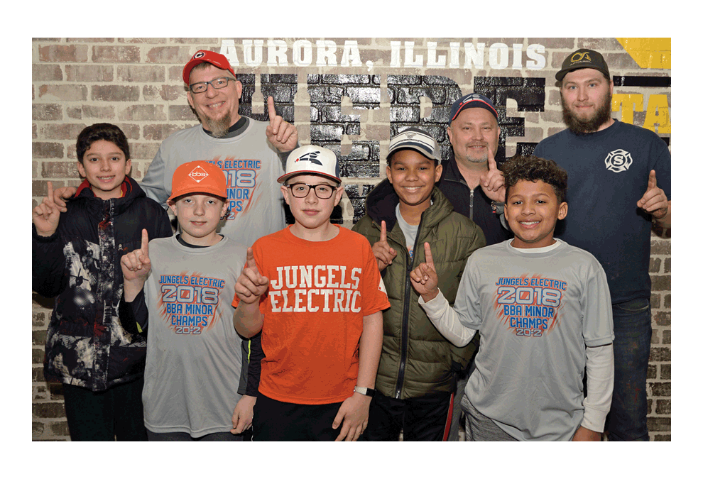 Jungels Electric Aurora Boys Baseball Minor League champion in 2018 participates in the fundraiser Monday at Buffalo Wild Wings in Aurora. Dustin Krueger/The Voice