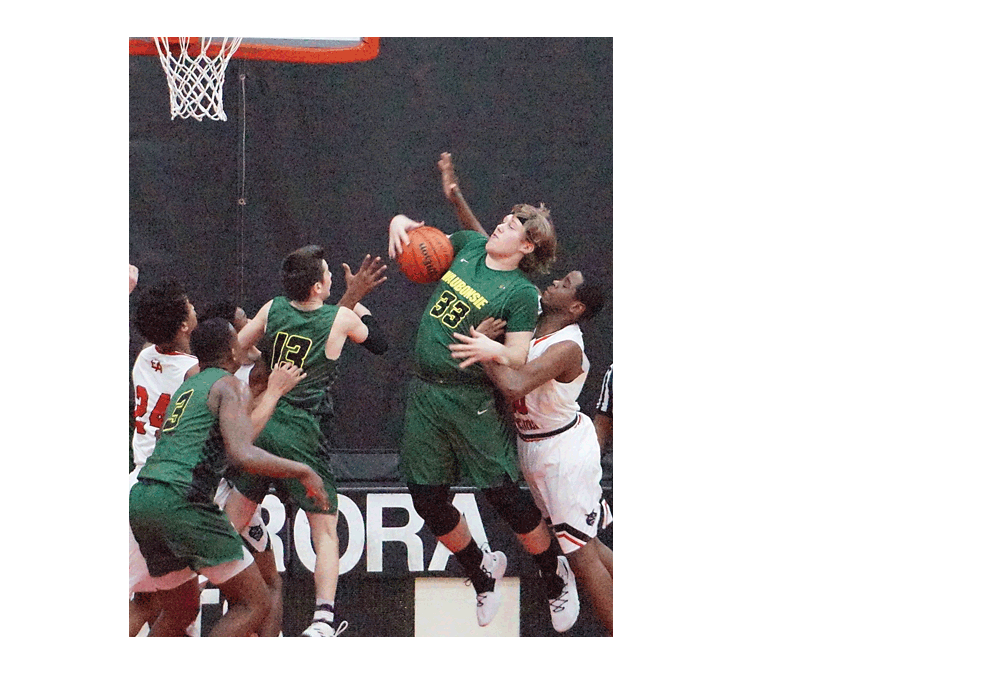 Cole Gregorio, 33, a 6-3 senior from Waubonsie Valley High School grabs a rebound and receives resistance from an East Aurora opponent Saturday in the DuPage Valley/Upstate Eight three-game competition at East Aurora. Waubonsie Valley won, 64-42. Carter Crane/The Voice