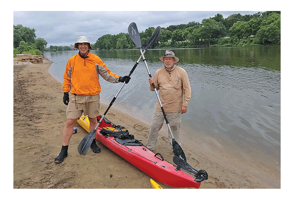 Fox River travelers’ presentation Monday, Feb. 11: Charlie Zine and Chuck Roberts pose in Aurora at a man-made kayak beach at Veterans Island in Aurora on their trip on the Fox River from Colfax, Wis. to Ottawa. They will give a presentation Monday, Feb. 11 at Valley of the Fox Sierra Club’s meeting at the Batavia Public Library. Submitted photo