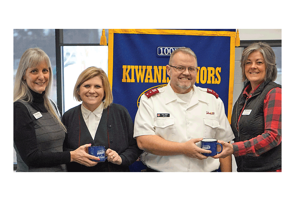 Kiwanis coffee mugs were presented to Linnea and Rich Forney, center, Salvation Army of Aurora officers, after their presentation at the Kiwanis Club of Aurora meeting Tuesday at the Prisco Center in Aurora. Kiwanian Amy Roth, left, and Kiwanis president Kim Groom were the presenters. The presentation included the success of their Angel Tree program which provides gifts to children in need who would otherwise be without Christmas presents. In 2018, the program in Aurora helped more than 3,000 children. They purchased the former Moose Lodge on Redwood Drive in Aurora and had the building demolished this week. They are set to break ground June 10 and will build and open phase 1 of the new facility in a year. The current facility is at 437 E. Galena Boulevard on the City’s East Side. Jason Crane/The Voice