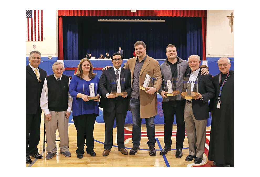 Marmion Academy HOF: Marmion Academy inducts five new members into its Athletic Hall of Fame Friday, Feb. 8. From left, Anthony Tinerella 1984, head of school and principal; Mike McLean and Kristine McLean, father and wife of Tom McLean 1984; Nico Jimenez 2010; Graham Glasgow 2011; Ryan Glasgow 2012; coach Kevin O’Connor; abbot John Brahill, OSB 1967, president of Marmion. Brian Cole photo