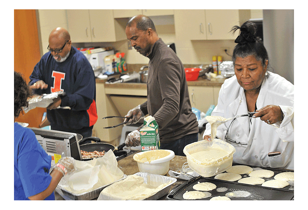 The Quad County Urban League’s annual pancake breakfast fundraiser Saturday at the Eola Community Center in Aurora provides good food and raises funds for the organization. Jason Crane/The Voice
