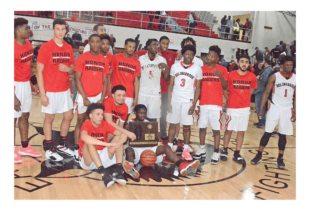 Boys Class 4A East Aurora Sectional champion: Bolingbrook High School’s boys basketball team savors the sectional championship Friday following a thrilling 66-64 victory against Oswego East in the championship game. Bolingbrook advanced to Tuesday’s super-sectional against 2018 State champion Belleville West at Illinois State University in Normal. Al Benson/The Voice