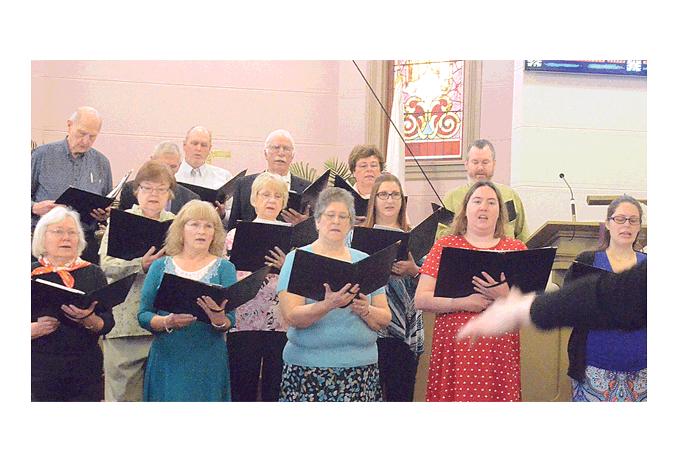 One A-Chord choir sings at Oswego's Church of the Good Shepherd United Methodist's UMW 150 years of service observance Sunday, March 24. Sue Gilla of Aurora supplied organ and piano music. Guest preacher was Dottie Priddy of Channahon, former Aurora District UMW president. Al Benson/The Voice