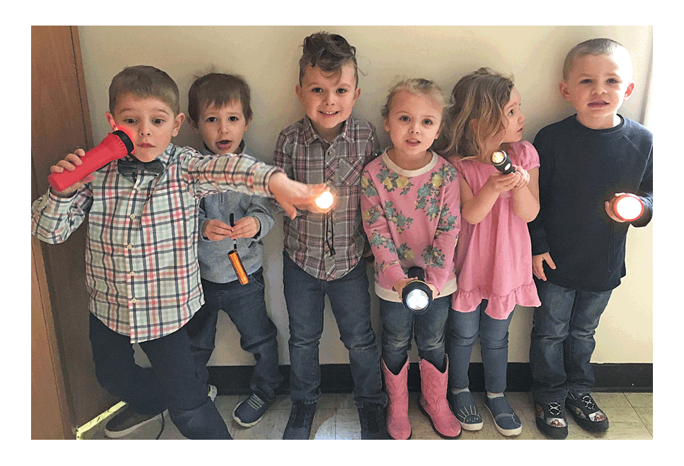 First Lutheran Church of Plano preschool students reflect how disciples bask in a bright light. From left, Greyson, Gaige, Bo, Elizabeth, Maddie, and John. Submitted photo