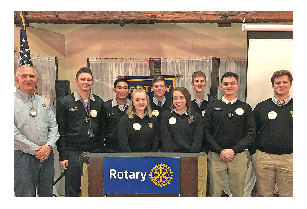 The Rotary Club of Aurora meeting Monday includes high school seniors, four from Aurora Central Catholic (ACC) and four from Marmion Academy, who shared their high school experiences, extra curricular activities, and plans after high school graduation. From left: Charlie Zine, president Aurora Rotary Club; Caleb Ritzheimer, Marmion; Jacob Caceres, Marmion; Julia Janiecek, ACC; Claire McCarthy, ACC; Nathan Sundberg, ACC; Joseph Farrell, Marmion; Henry Cella, Marmion; and Charlie May, ACC. Gretchen Timm photo for Rotary Club of Aurora