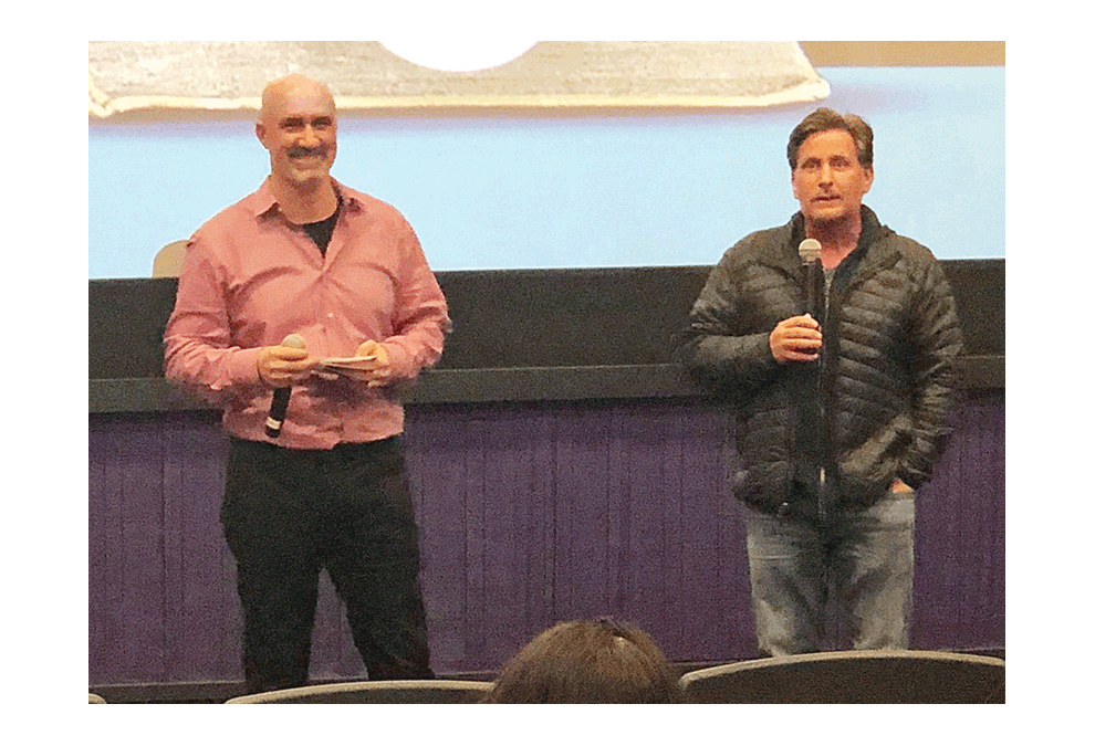 The movie “The Public” private screening, with Emilio Esteves, writer and director, right, visits the movie theatre Tinseltown recently in North Aurora. He and Ryan Dowd, left of Hesed House, take questions about the movie, a focus on homelessness. Dowd, executive director of Hesed House seeks to eliminates homelessness. The visit by Esteves at the private screening was a surprise. The movie release will be April 5. Christine Schirtzinger photo