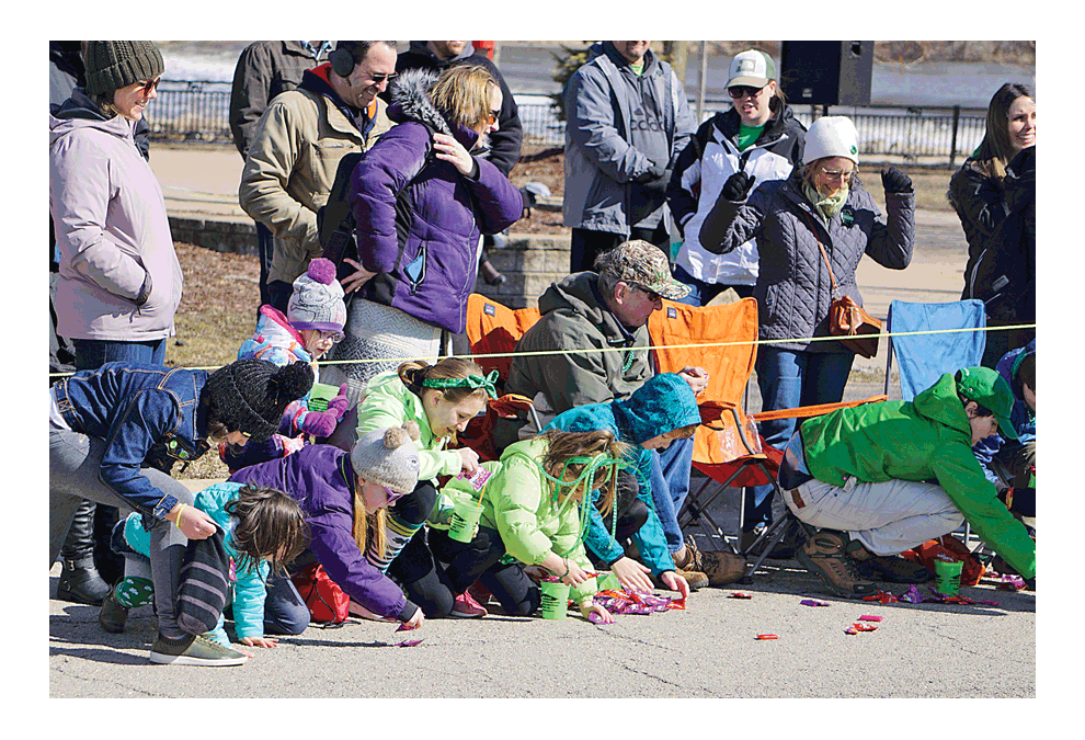Hometown-made Skittles and a parade: Children focus on candy: The second annual St. Patrick’s parade in Yorkville, Saturday, on Hydraulic Street, a part of the day-long celebration, includes a 5K run, musical acts, and Irish Dance lessons. Green themes offer delightful reactions of children who collect candy, including ample bags of Skittles, a product made at the factory in Yorkville. A video can be seen at facebook.com/thevoice.us. Carter Crane/The Voice