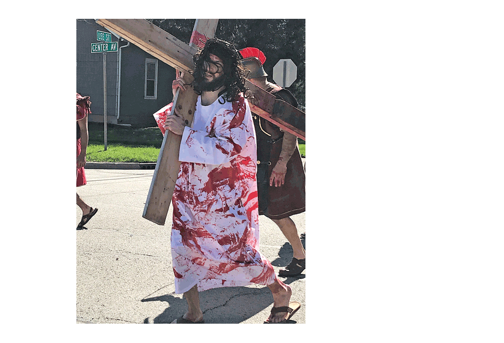 Actors portray the walk to Gethsemane where Jesus is nailed to the cross, along with two thieves in an annual passion play in Plano each Good Friday. Submitted photo