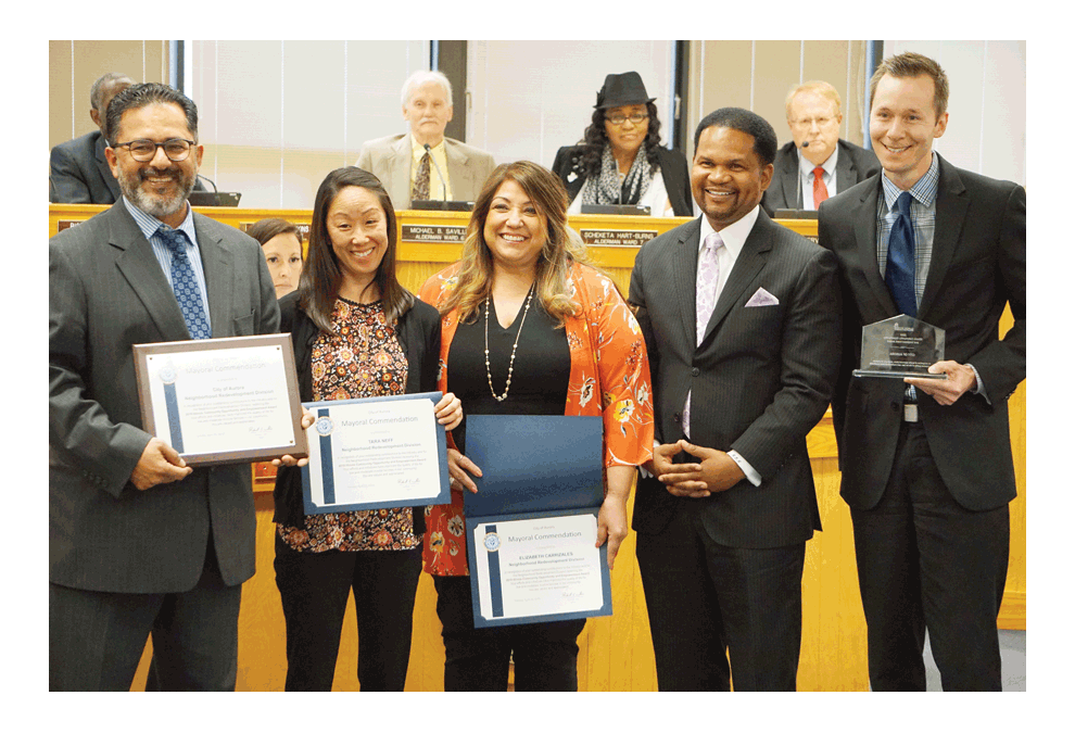 The Aurora city government's Neighborhood Redevelopment Division is honored at the Aurora City Council meeting Tuesday. Members received the 2019 Illinois Community Opportunity and Empowerment Award at the 2019 Illinois Governors Conference on Affordable Housing. The award was received for approved plans, programs, or projects that improve quality of life for low and moderate income households. The city government’s down payment assistance and rehabilitation programs, and investments in affordable housing were cited as benchmark programs. From left, Dan Barreiro, Tara Neff, Liz Carrizales, mayor Richard Irvin, and Chris Ragona.