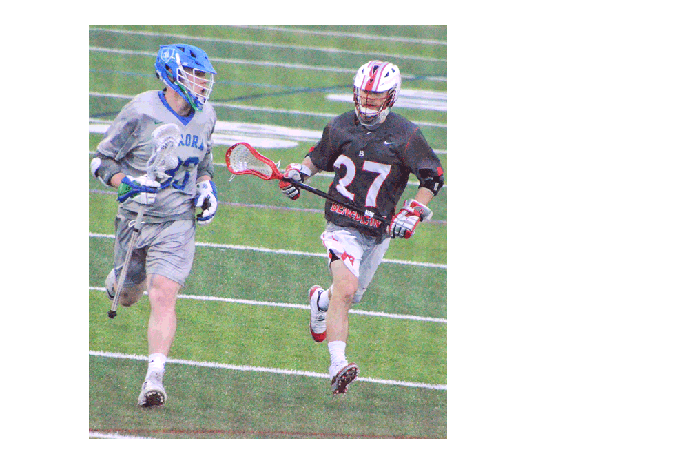 Aurora University's Nic Kruzlic, left, moves down the field and is defended by visiting Benedictine University's Luke Davis. Aurora University won 10-7 in lacrosse Wednesday, April 17. Al Benson/The Voice