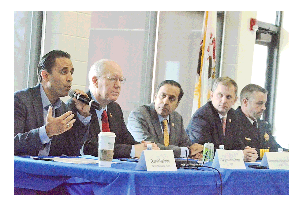 Harvard University business professor Deepak Malhotra, left, give remarks Friday at "Taking Time to Save Lives: A Discussion on Gun Violence" at Prisco Community Center in Aurora. Other panelists from left are host Illinois congressman Bill Foster, D-11th; congressman Raja Krishnamoothi, D-8th; congressman Sean Casten, D-6th; and Ron Hain, Kane County sheriff. Al Benson/The Voice