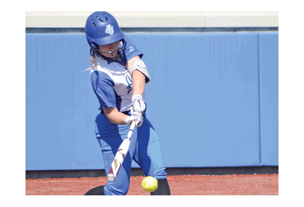 Aurora University's Mckenzie Flores connects during the Spartans' 4-0 loss Saturday to Marian University at Spartan Athletic Park in Aurora in the Northern Athletics Collegiate Conference (NACC) tournament. Aurora finished the this season with a 28-15 overall record and in third place in the NACC. Al Benson/The Voice