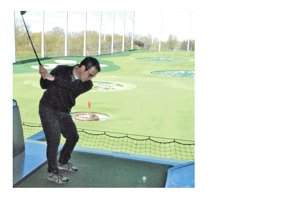 Matt Brolley, Montgomery Village president, takes a swing at the Greater Montgomery Area Chamber of Commerce’s annual Golf Outing at Top Golf in Naperville Friday. Proceeds support the Waubonsee Community College Scholarship Fund. Established 20 years ago, the GMACC founders had a vision to establish a network of Montgomery-area businesses dedicated to supporting one another and establishing a presence through community interaction. Jason Crane/The Voice