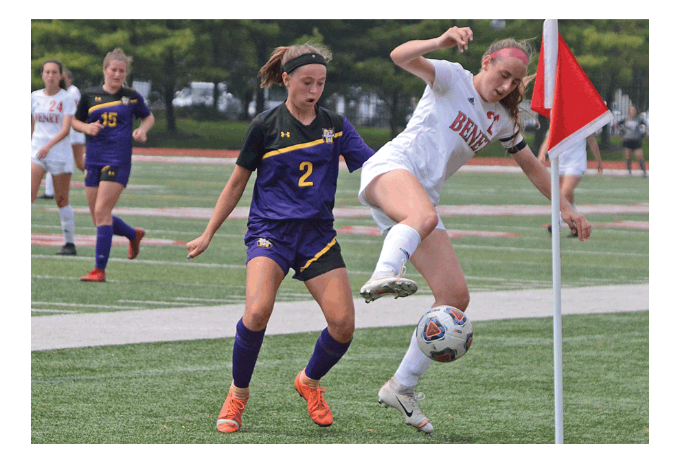 Benet Academy's Abby Casmere and Wauconda's Jordan Bodden, 2, focus on the ball in Benet's IHSA Class 2A 2-1 overtime State championship game victory at North Central College in Naperville Saturday
