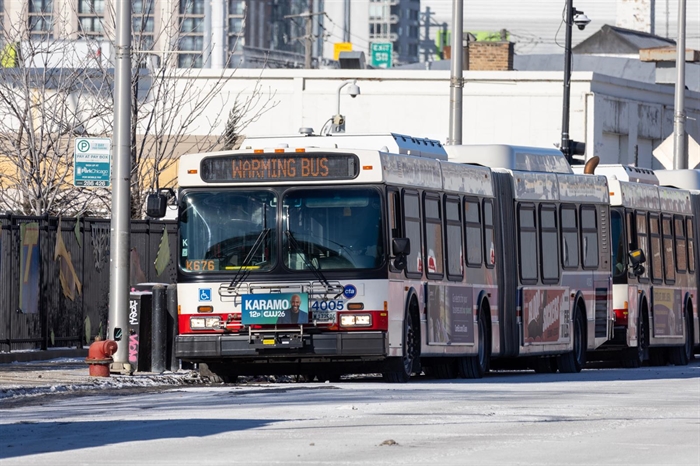 Chicago Transit Authority “warming buses” are pictured idling outside the city’s “landing zone” facility where migrants are dropped off after being bused from Texas.