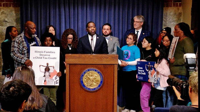State Rep. Marcus Evans, D-Chicago, is joined by a coalition of advocates at a Statehouse news conference to push for a $300 per-child tax credit. (Capitol News Illinois photo by Andrew Campbell)