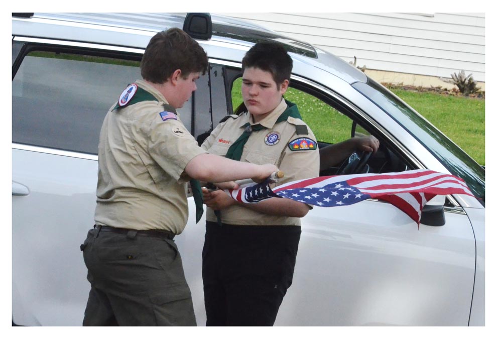Blackhawk Troop 11 in Aurora gather flags after Memorial Day – The Voice